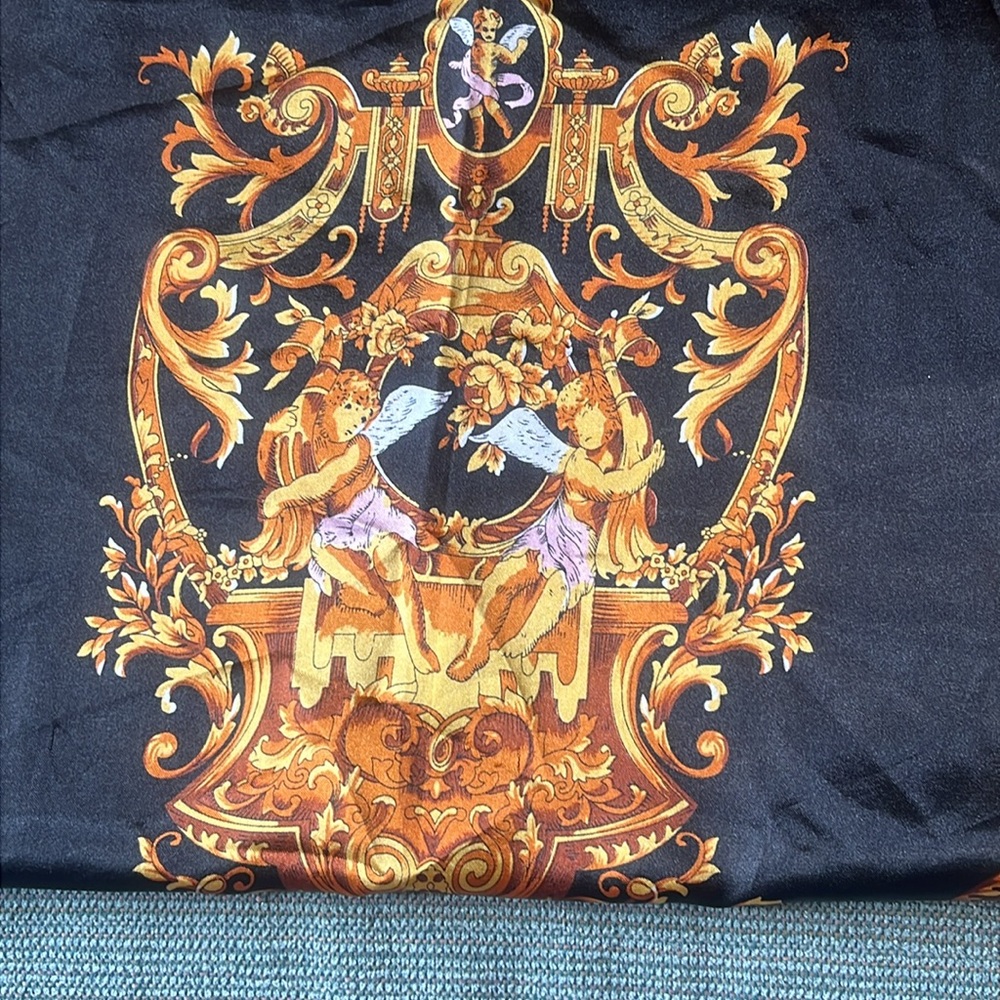 Angel crested scarf with cheetah print and finial corners featuring puti angels